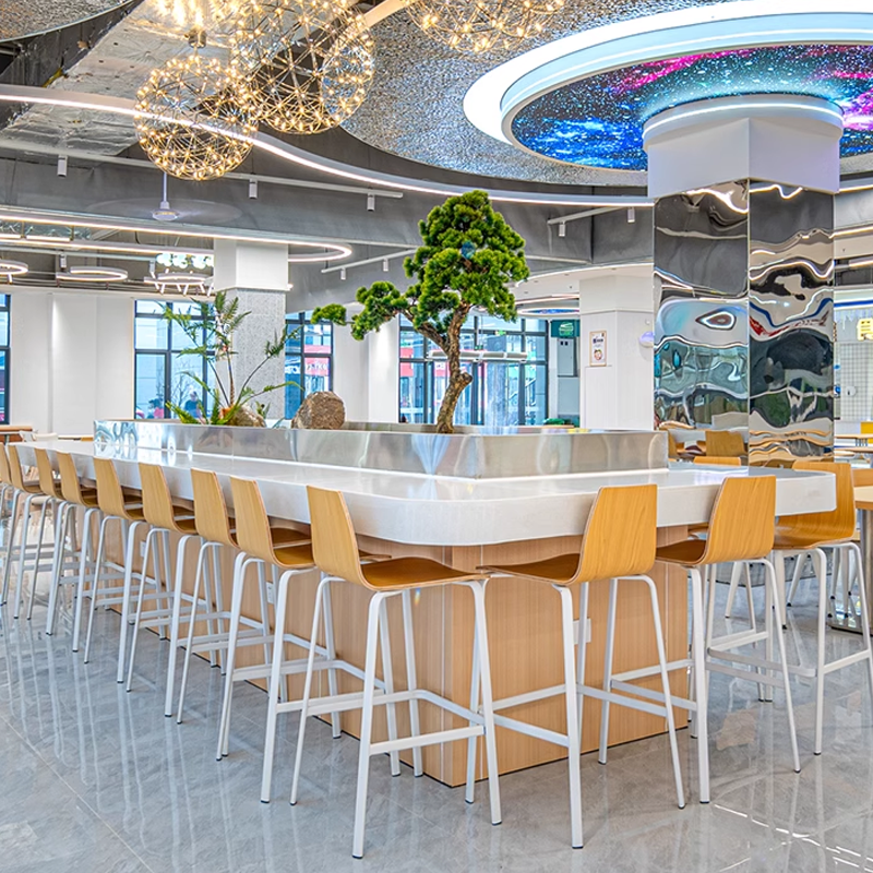 contemporary bar stools in a stylish bistro bar, with high stools around a modern counter in a chic interior.