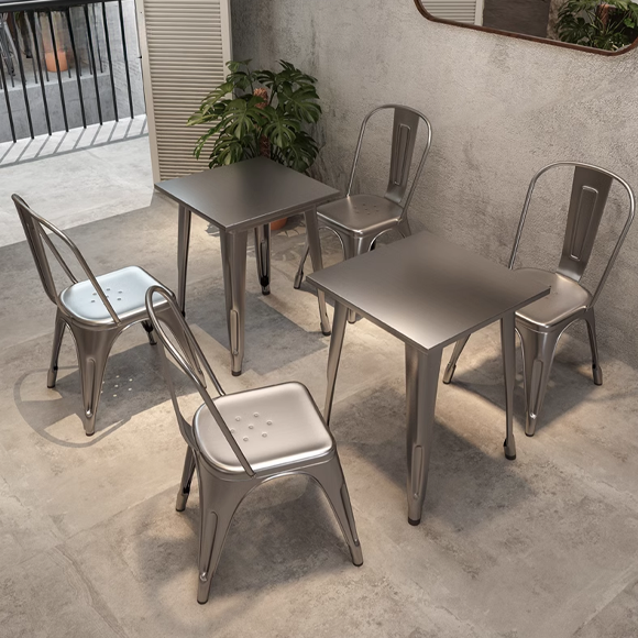 Compact four-seater dining set with metal chairs and a square dining table, industrial design, ideal for modern spaces.