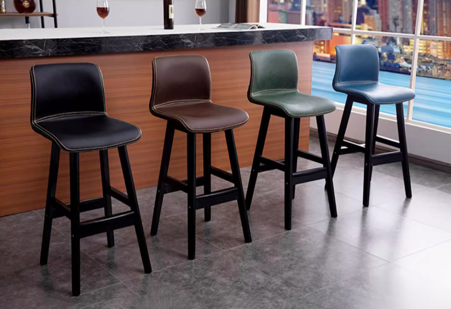 Minimalist bar stool featuring a sleek black leather seat with a simple wooden frame, perfect for adding a touch of elegance to any modern home bar or kitchen counter.