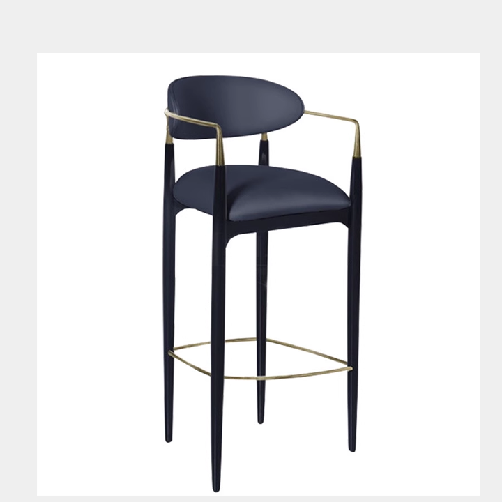 Dark blue upholstered bar stool with a gold armrest and a black metal frame, featuring a sleek design.