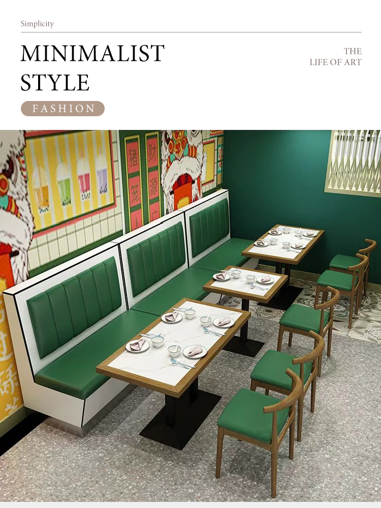 Minimalist style restaurant interior with green booth seating, matching wooden chairs, white marble tables, and colorful mural decor for a modern dining experience