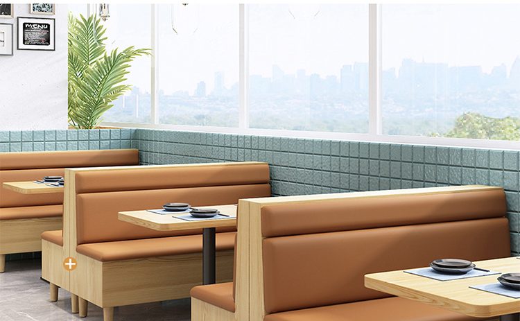 Restaurant seating featuring a solid wood frame with orange leather cushions, made from high-quality raw materials and multi-layered solid wood panels.