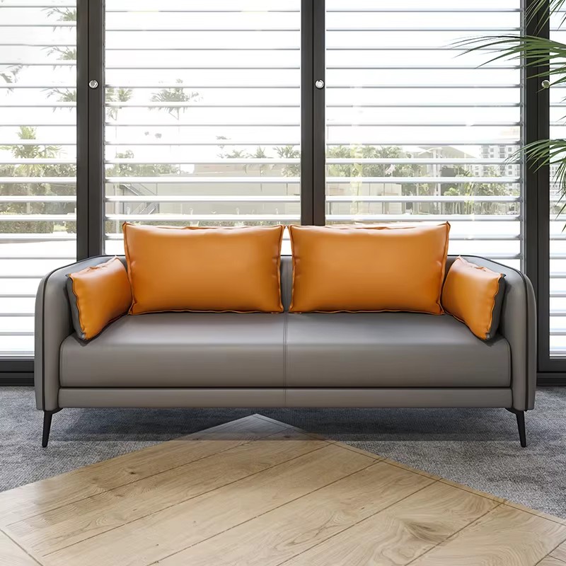 Modern Gray Sofa with Orange Cushions