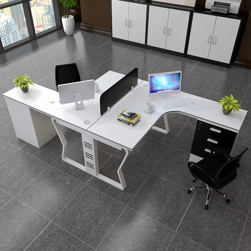 L-shaped office desk with storage cabinets and ergonomic chairs