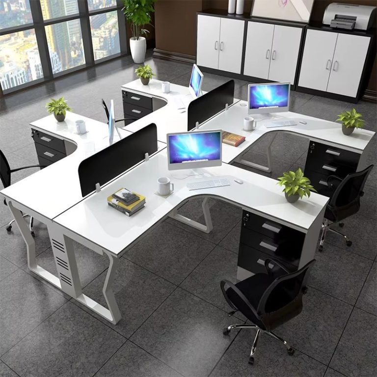 Modern office workspace with L - shaped desks