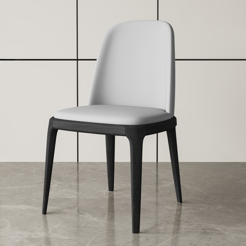 Gray leather dining chair with black frame on marble floor