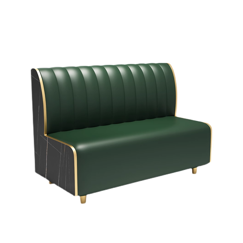 Luxury green leather dining booth with vertical channel tufting and golden accents, perfect for upscale restaurant interiors.