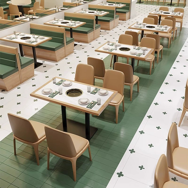 Modern dining booth and chair set with green and beige seating, perfect for stylish restaurants and cafes.