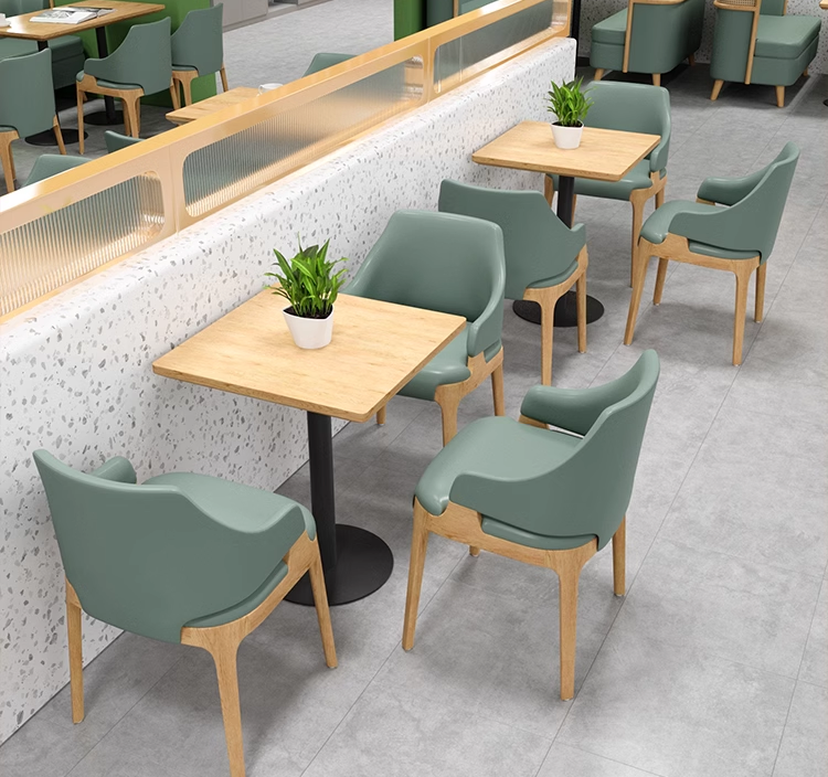 Green Chair with Wooden Legs in a Modern Cafe Setting