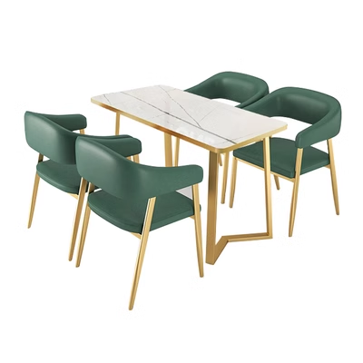 Green leather dining chair with gold frame, perfect for modern restaurant interiors.