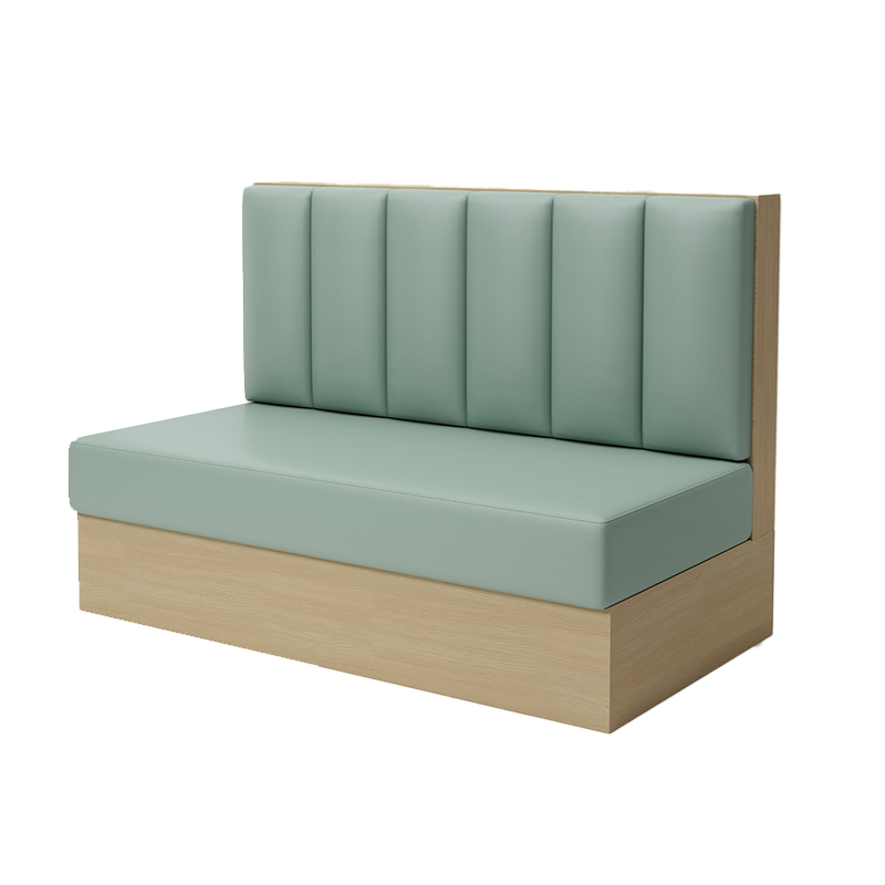 Green padded booth seating with a light wooden base, ideal for modern restaurant interiors.