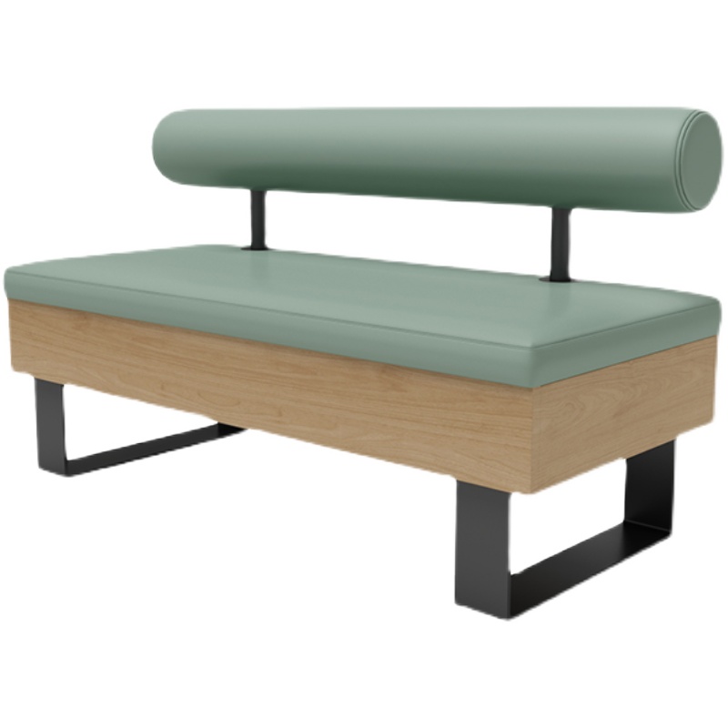 Green cushioned bench with a cylindrical backrest, wooden frame, and black metal base, designed for modern dining spaces.