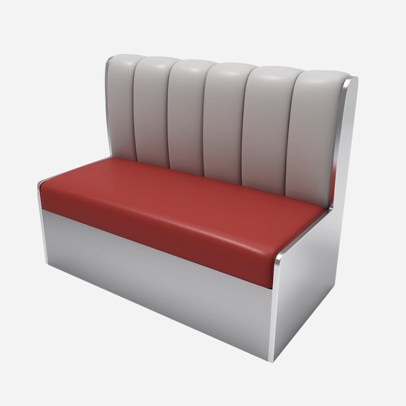 Red and white dining booth with a padded seat and channel-tufted backrest, featuring a durable and stylish design.