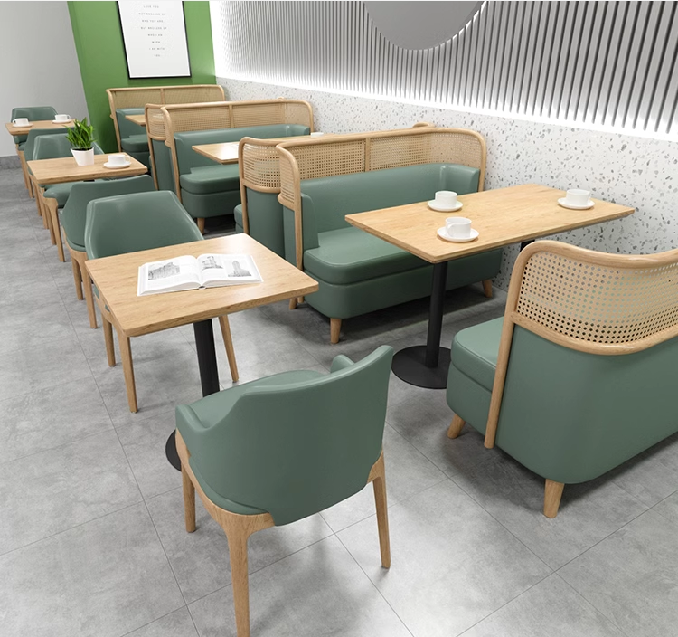 restaurant dining area with green chairs, wooden tables, and contemporary design, ideal for cafe or restaurant interiors