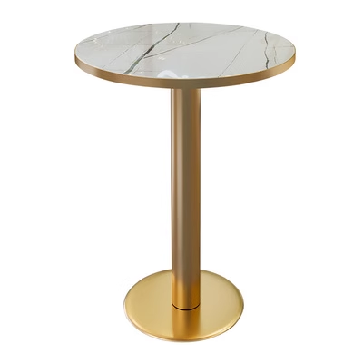 A round marble table with a golden base, ideal for chic cafes and elegant spaces