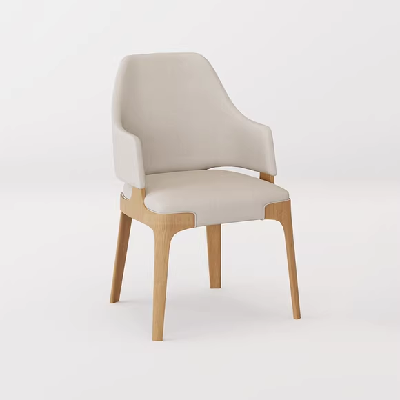 Sleek white chair with wooden legs and armrests, offering a contemporary look and comfort for any space.