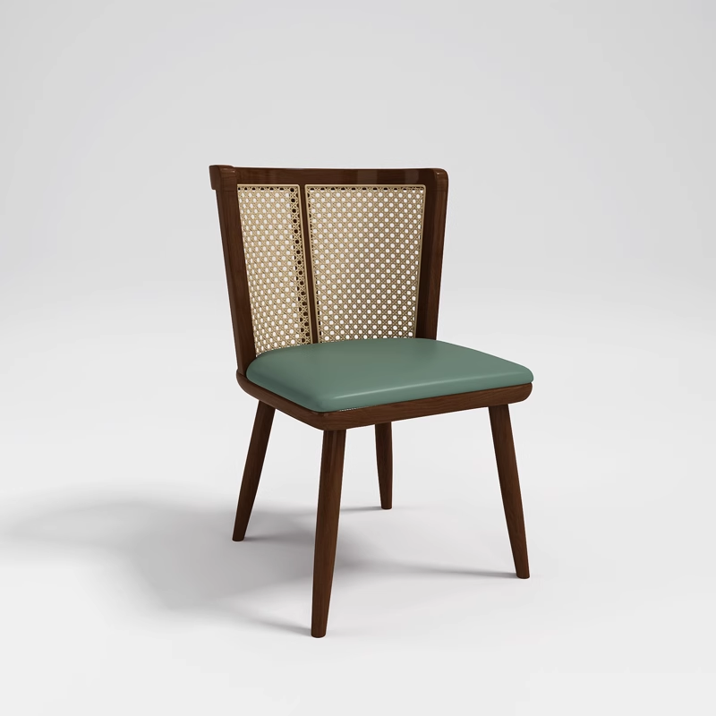 Modern wooden dining chair with a cane backrest and green seat cushion.