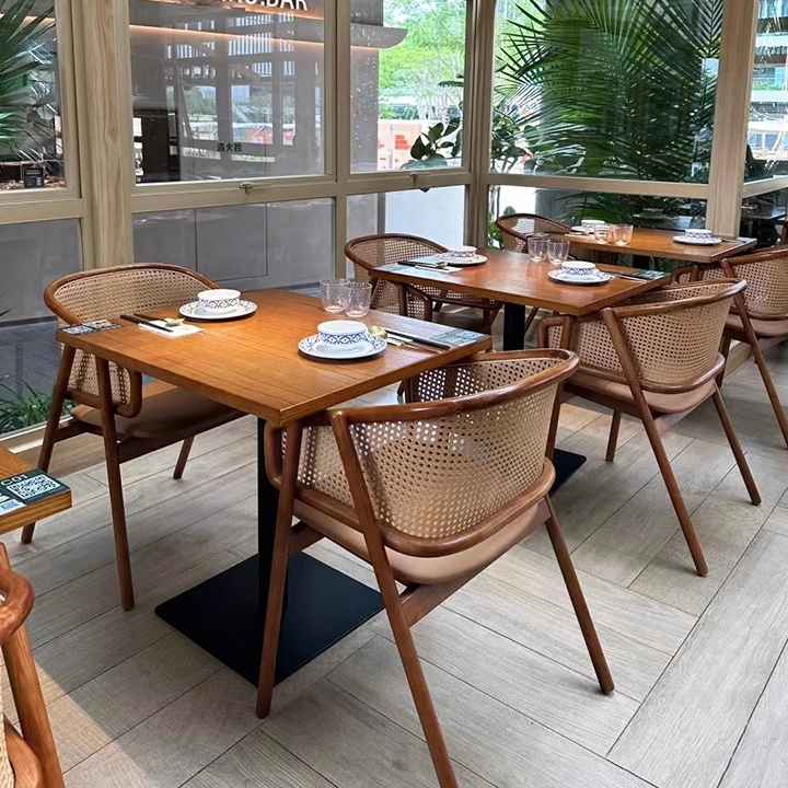 Modern Dining Room with Wooden Cane Chairs and Square Tables, Natural Wood Finish, Contemporary Restaurant Design