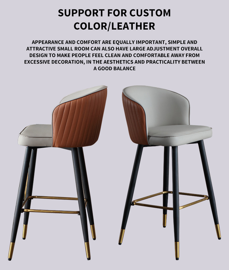 Gray bar stool with orange leather back, black steel legs, and gold footrests.