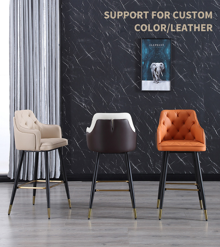 Modern bar stool featuring a black and gold frame with a customizable color leather seat. The chair has a comfortable backrest and sturdy legs.