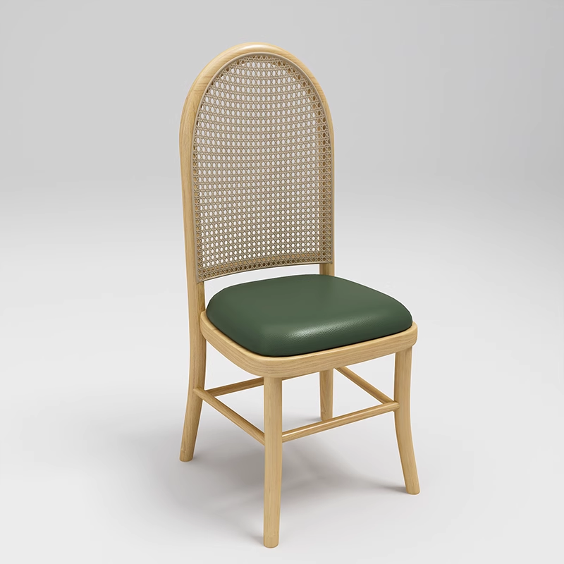 Cane back dining chair with green leather cushion and wooden legs