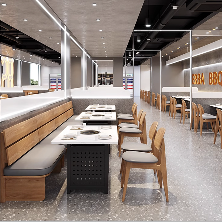 modern restaurant interior featuring light-colored chairs, marble-top tables, and wooden seating.