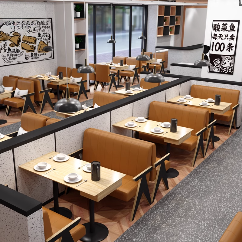 Modern restaurant booth seating with wooden tables, black legs, and stylish chairs with cushions.