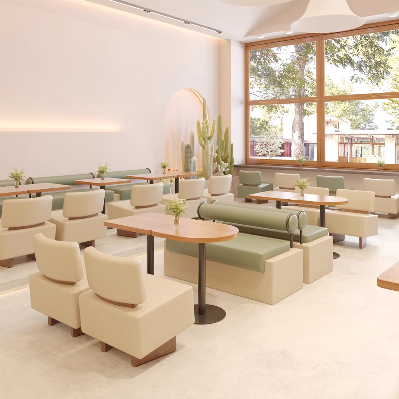 Modern restaurant cafe interior with wooden tables, light-toned seating, and natural lighting.