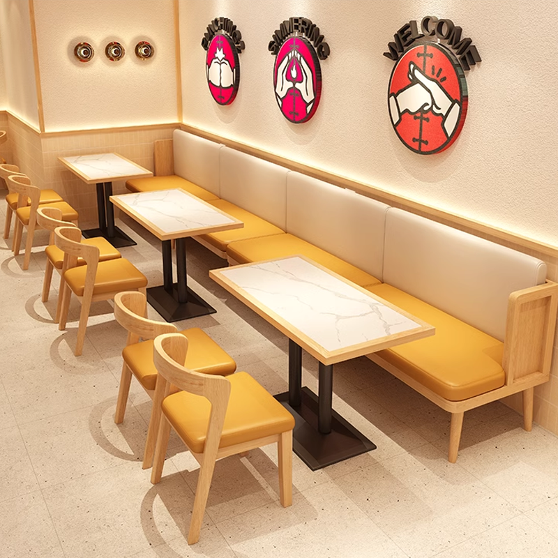 Tables with yellow chairs in a modern restaurant interior.